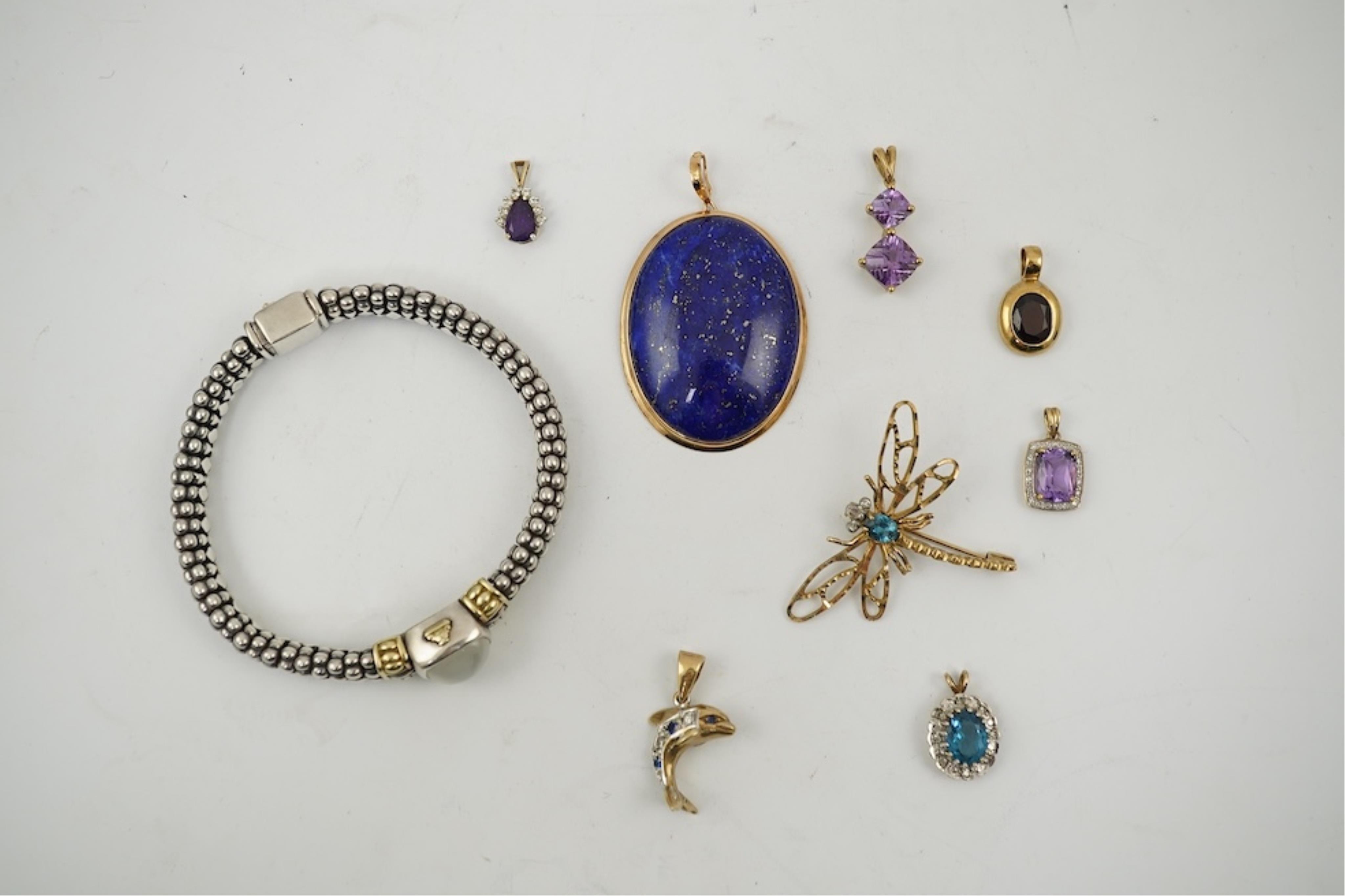 Five assorted modern 375 yellow metal and gem set pendants, a yellow metal and lapis lazuli set pendant (stamped 585?) 40mm, together with a yellow metal dragonfly brooch, a similar small pendant and a white metal bracel